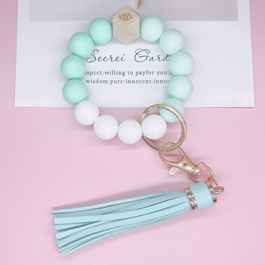 Llavero bohemio de la muñeca de la borla del cuero al por mayor del silicón